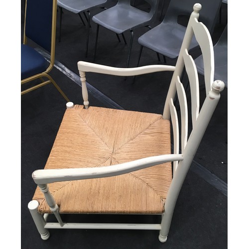 461 - Large rustic painted open arm chair with cane seat 100x78x63cm.