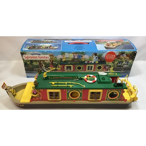 13 - Sylvanian Families Canal Boat found here boxed and in VG+ condition with a set of otter family membe... 