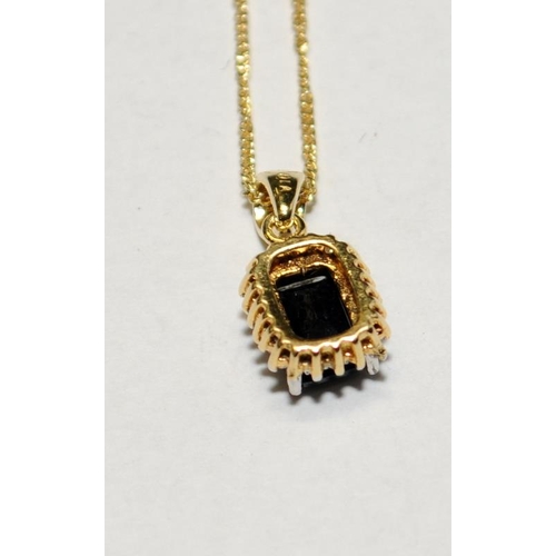 495 - Sapphire accent diamond gold on silver pendant