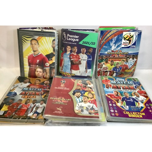 24 - Football trading cards x 11 folders. These folders have titles - Adrenalyn- Match Attack - Shoot Out... 