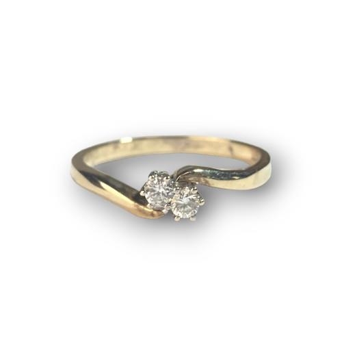 458 - A 9ct Gold Ladies Cross Over Ring, Set with 2 Brilliant Cut Diamonds. Size O