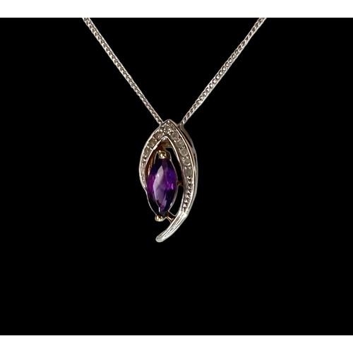 542 - A 9ct Gold Diamond & Amethyst Pendant necklace