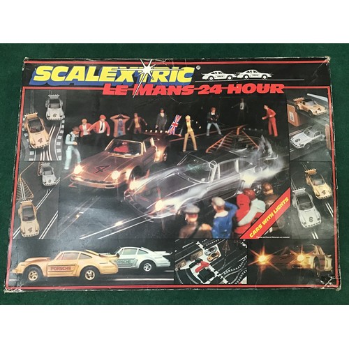 34 - Great collection of 4 boxes of Scalextric. Not checked but each set contains cars and are titled - L... 