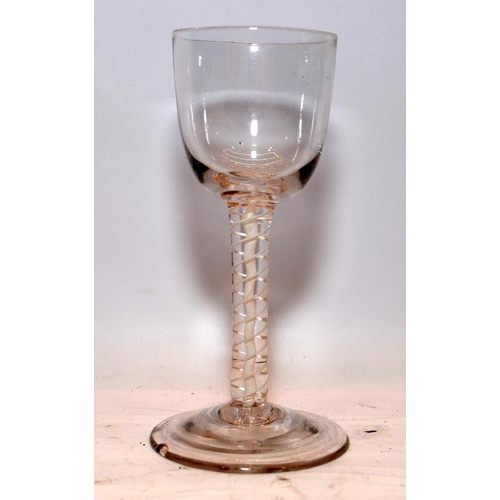 180 - Georgian wine glass with opaque double twist stem. Slight shell to foot edge. 14.5cms tall