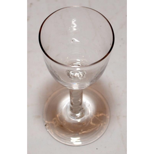 180 - Georgian wine glass with opaque double twist stem. Slight shell to foot edge. 14.5cms tall