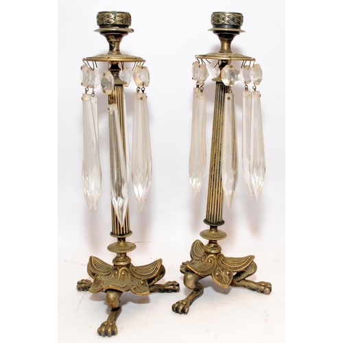 182 - Pair of French Empirical candlesticks with cut glass drops. 26.5cms tall