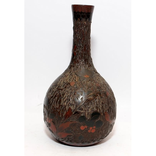 284 - Antique Oriental Totai tree bark cloisonne over porcelain bottle shaped vase. 16cms tall