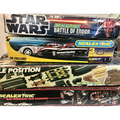 34 - Great collection of 4 boxes of Scalextric. Not checked but each set contains cars and are titled - L... 