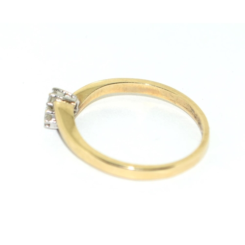 458 - A 9ct Gold Ladies Cross Over Ring, Set with 2 Brilliant Cut Diamonds. Size O