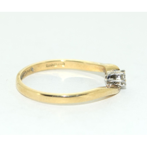 458 - A 9ct Gold Ladies Cross Over Ring, Set with 2 Brilliant Cut Diamonds. Size O