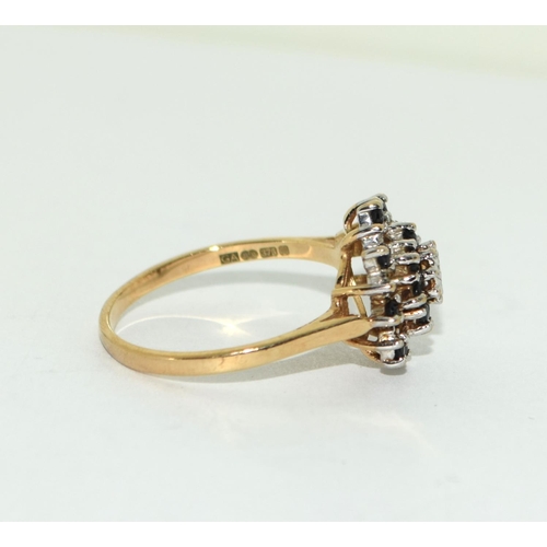 481 - A 9ct Gold Ladies Cross Over Ring, Set with 2 Brilliant Cut Diamonds. Size O