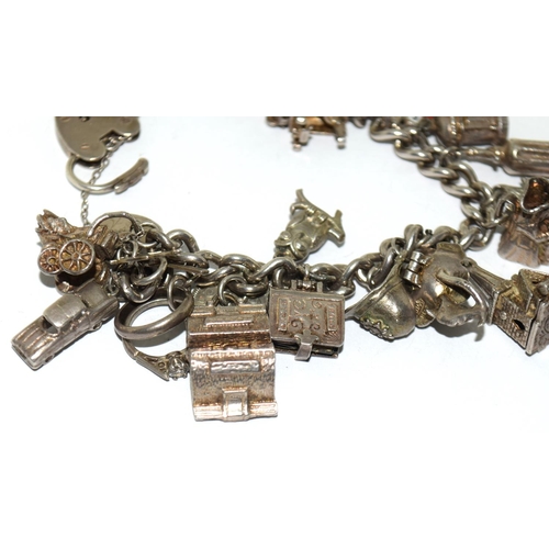 471 - 925 silver charm bracelet and charms approx 20 75g