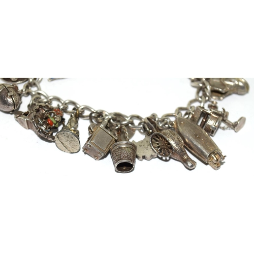 389 - 925 silver charm bracelet and charms approx 20 80g