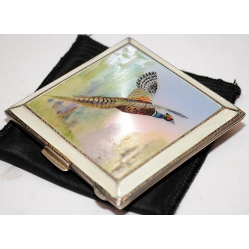 373 - Vintage sterling silver compact in square form with a hand painted panel depicting a pheasant in fli... 