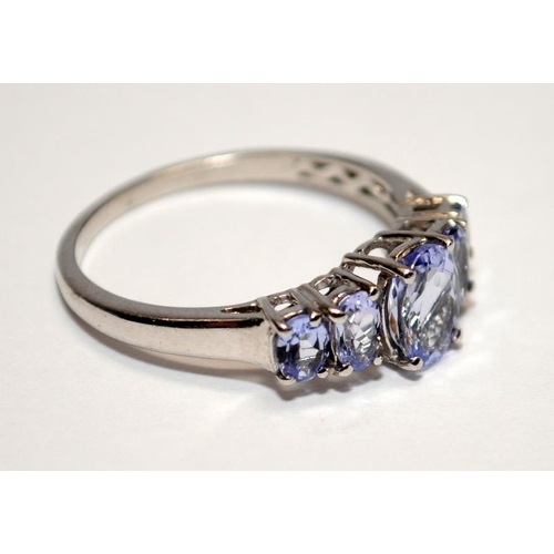 434 - A 925 silver and five stone tanzanite ring Size P