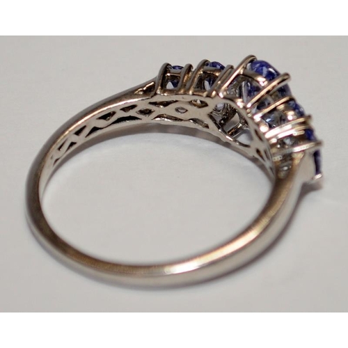 434 - A 925 silver and five stone tanzanite ring Size P