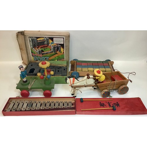 49 - Great selection of vintage wooden child’s toys to include Tri-ang Fort in original box plus 2 pull a... 