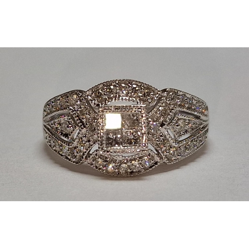 465 - A 9ct white gold and diamond ring Size L