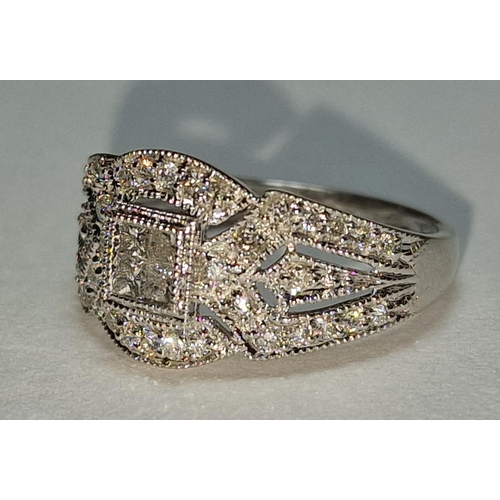 465 - A 9ct white gold and diamond ring Size L