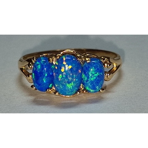 456 - A 9ct gold and three stone opal ring Size M