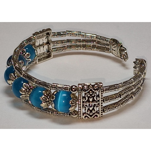 432 - A Tibetan silver bracelet.