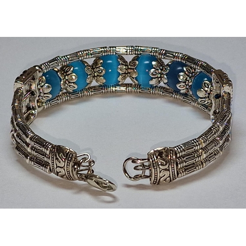 432 - A Tibetan silver bracelet.