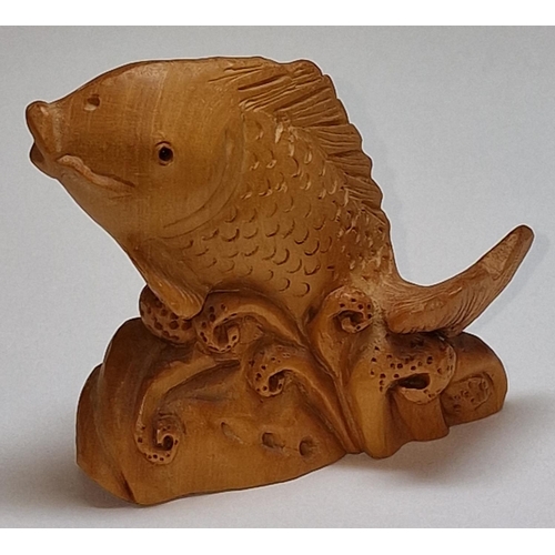 207 - A netsuke fish.