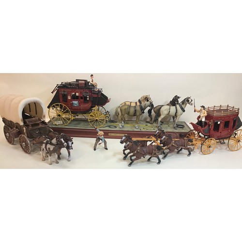 55 - Franklin Mint Wells Fargo Stagecoach complete with 4 Horses - Luggage - Rifles etc plus 2 other plas... 