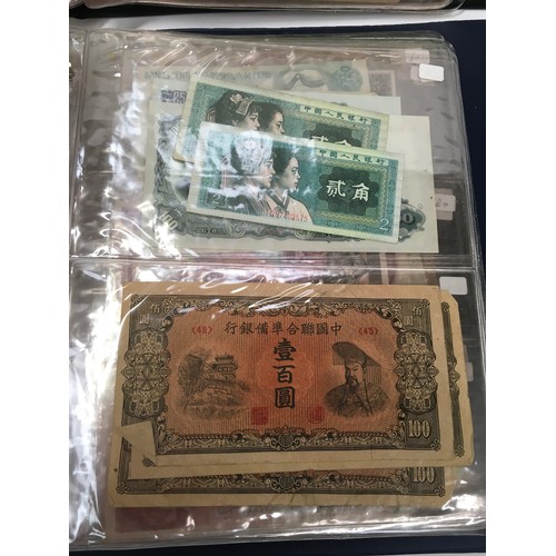 219 - 240+ banknotes in two albums (Blue & Black).