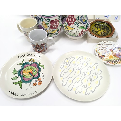 321 - Poole Pottery large collection to include Freeform plate and traditional pieces (13).