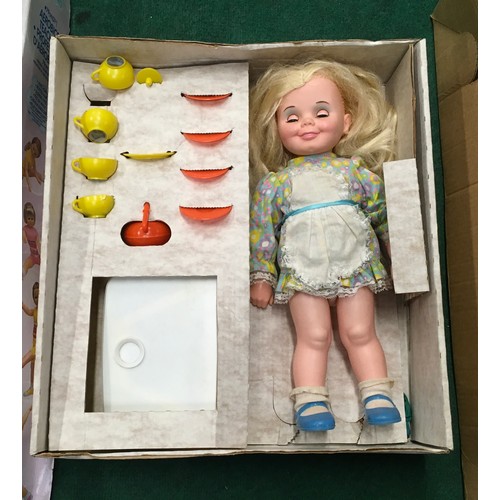 133 - Collection of mid 20th century large dolls to include boxed Palitoy Tracy's Tea Party (3).