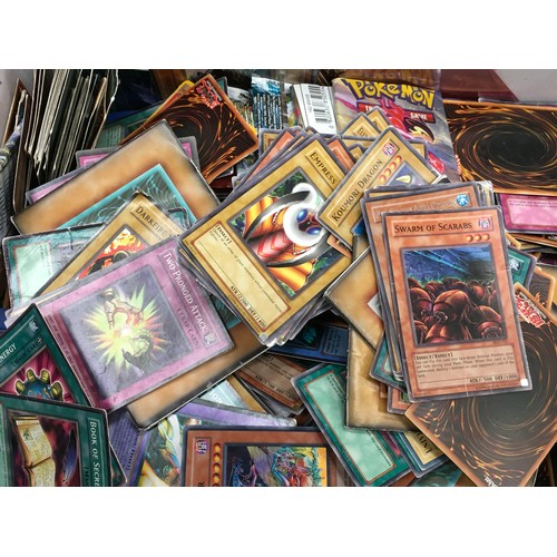 145 - Box of unsorted trading cards mainly Yu-Gi-Oh and Pokemon. Good lot to sort through.