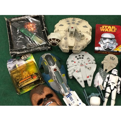 155 - Large collection of Star Wars merchandise to include figurines, lego and other pieces.