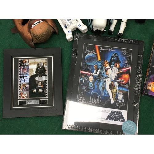 155 - Large collection of Star Wars merchandise to include figurines, lego and other pieces.