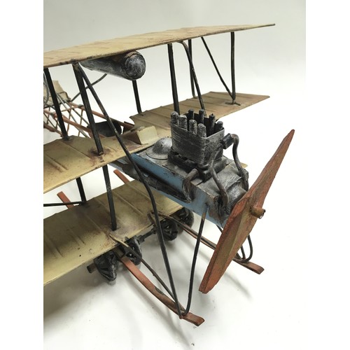 130A - Metal handmade model of a Tri-Plane. Made to a good standard.