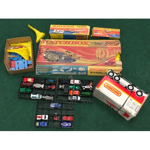 158 - Matchbox Superfast collection of boxed racetrack (not checked) together with a Matchbox carry case o... 