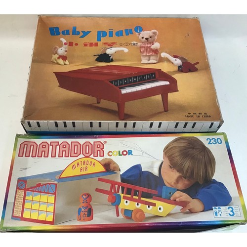 129 - Wooden toys to include crane - car transporter with 4 small cats - Baby boxed piano and boxed Matado... 