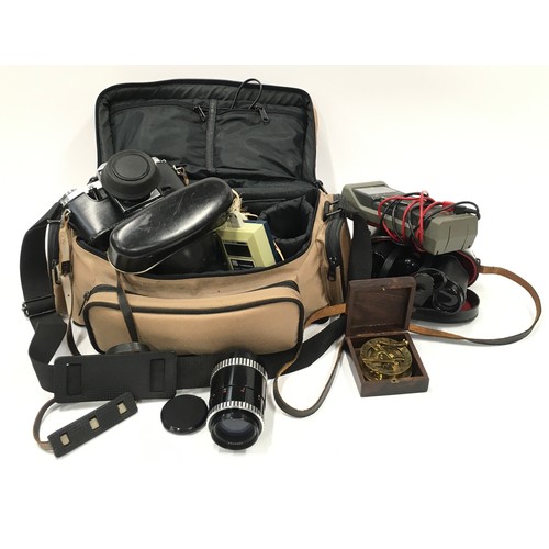 366 - Practica camera in travel case with misc lens and equipment, Binoculars, Brass compass together a po... 