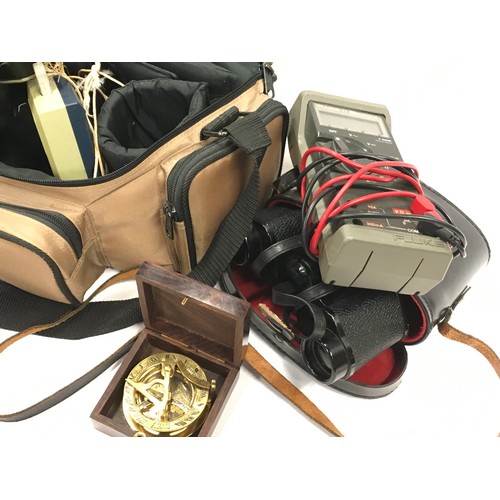 366 - Practica camera in travel case with misc lens and equipment, Binoculars, Brass compass together a po... 