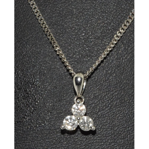 444 - 9ct white gold chain and diamond trefoil pendant.