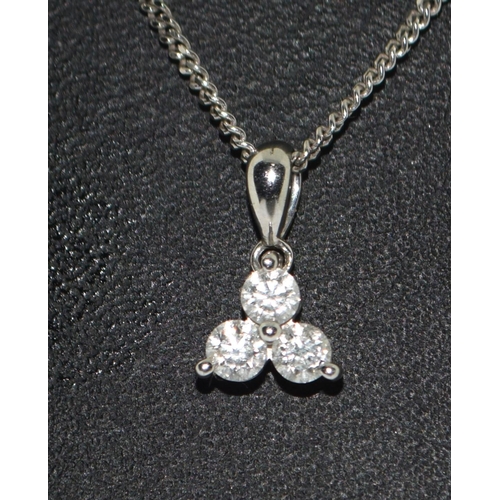 444 - 9ct white gold chain and diamond trefoil pendant.