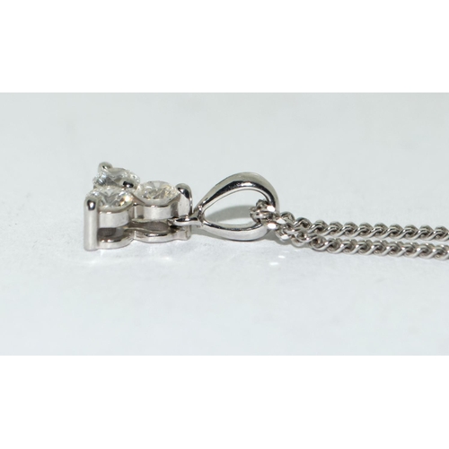 444 - 9ct white gold chain and diamond trefoil pendant.