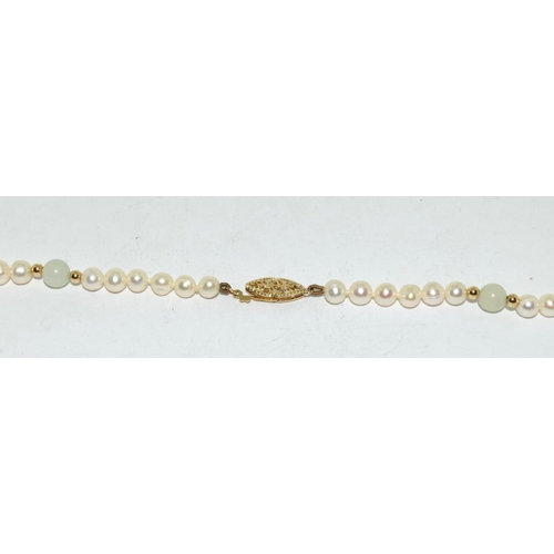 540 - Pearl and moonstone necklace with 14ct clasp.