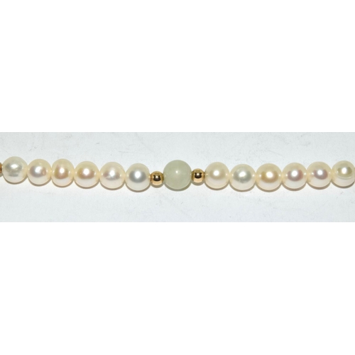 540 - Pearl and moonstone necklace with 14ct clasp.