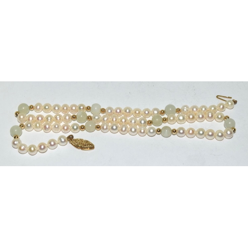 540 - Pearl and moonstone necklace with 14ct clasp.