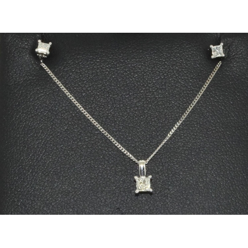 544 - 9ct white gold stud earring and pendant set.