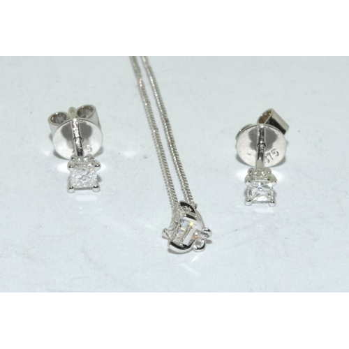 544 - 9ct white gold stud earring and pendant set.