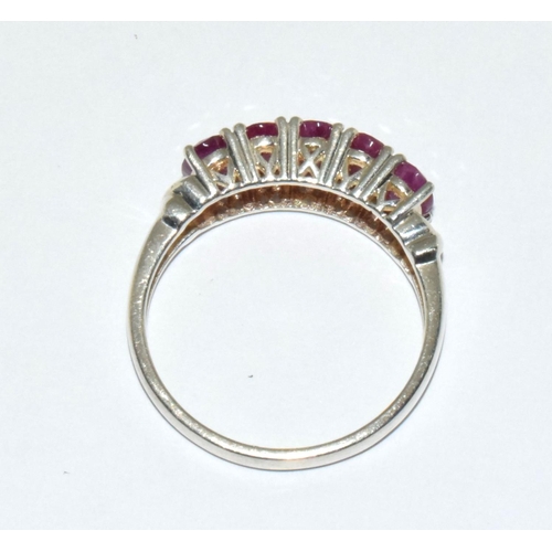 524 - A ruby five stone silver ring Size U