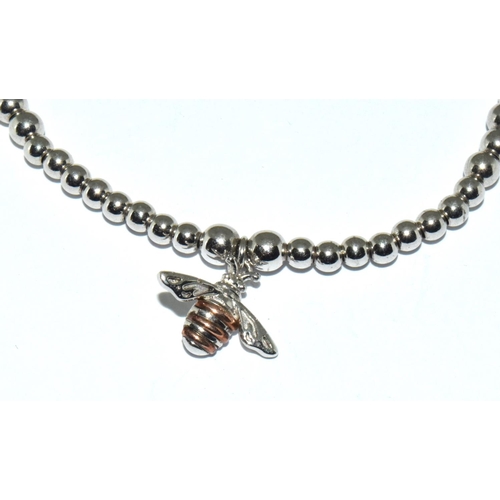 517 - Clogau Welsh gold and silver bee bracelet.