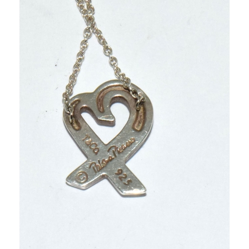 472 - Tiffany & Co Paloma Picasso silver loving heart necklace.